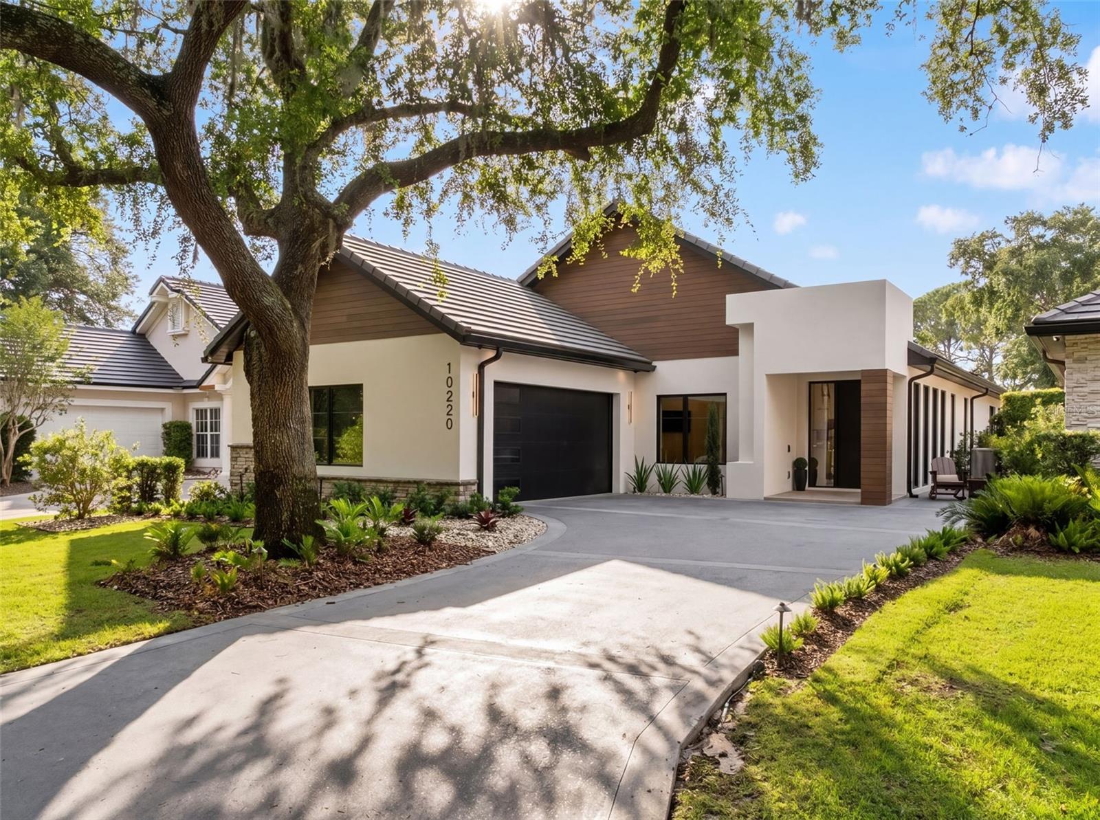 10220 CHILTERN GARDEN, ORLANDO FL 32827 — MLS #MFRO6409134 | 4 Bed 5 Bath Home