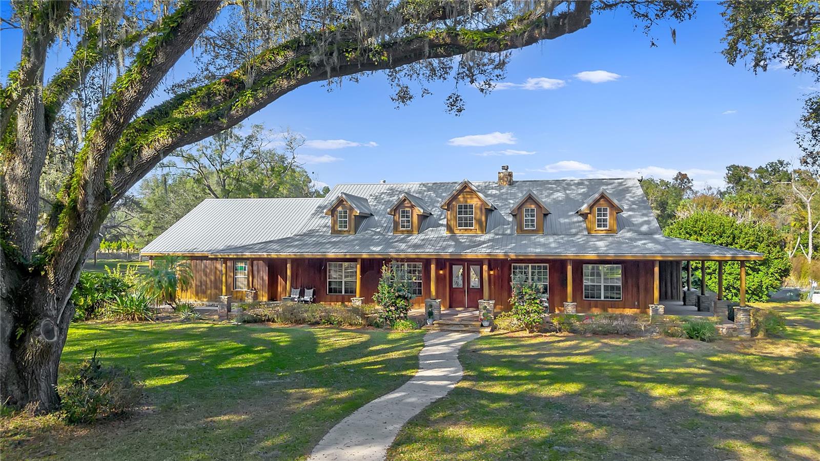 27737 COUNTY ROAD 44A, EUSTIS FL 32736 — MLS #MFRO6371691 | 4 Bed 4 Bath Home