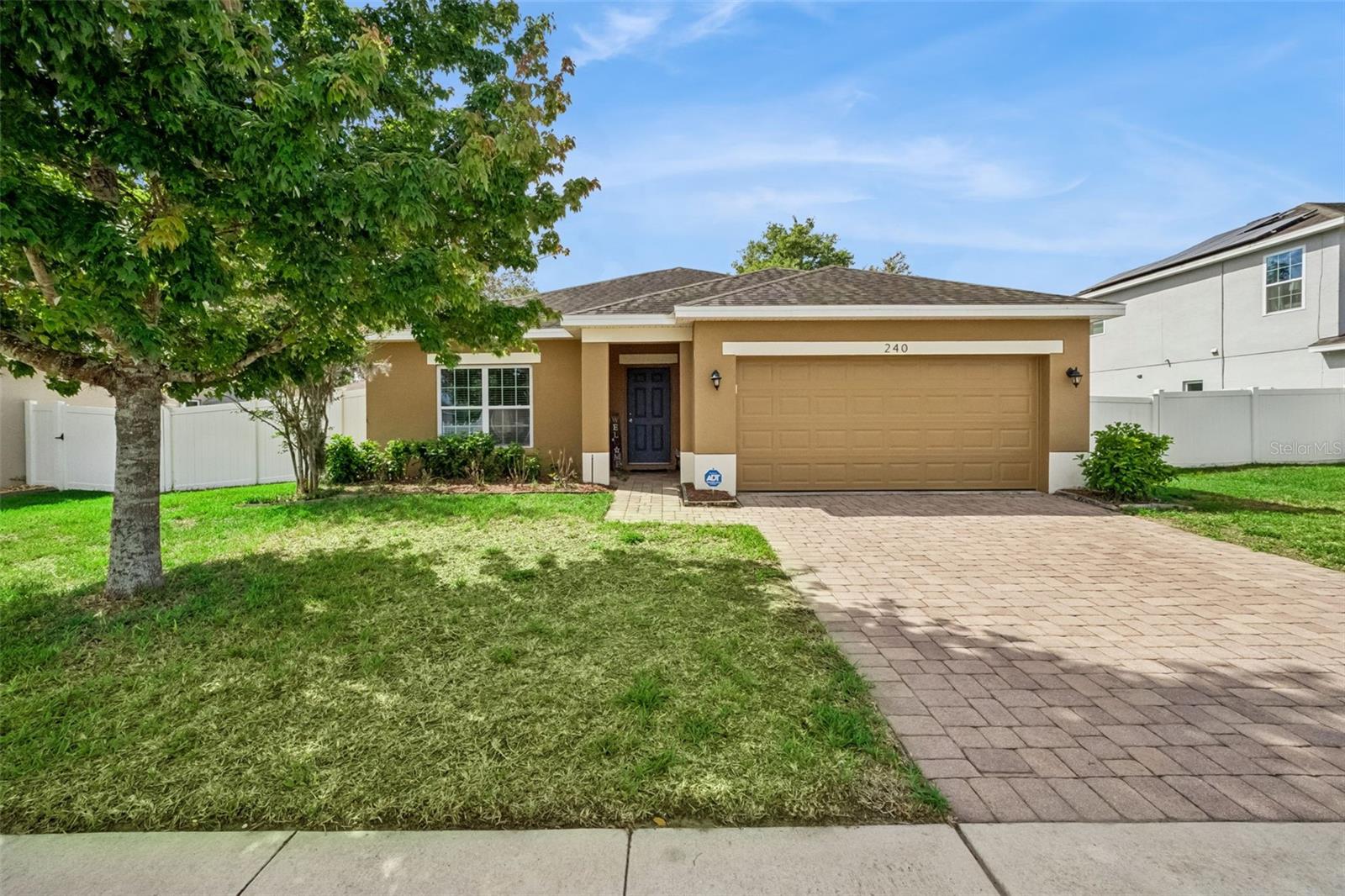 240 WHISPERING PINES, DAVENPORT FL 33837 — MLS #MFRO6395457 | 4 Bed 2 Bath Home