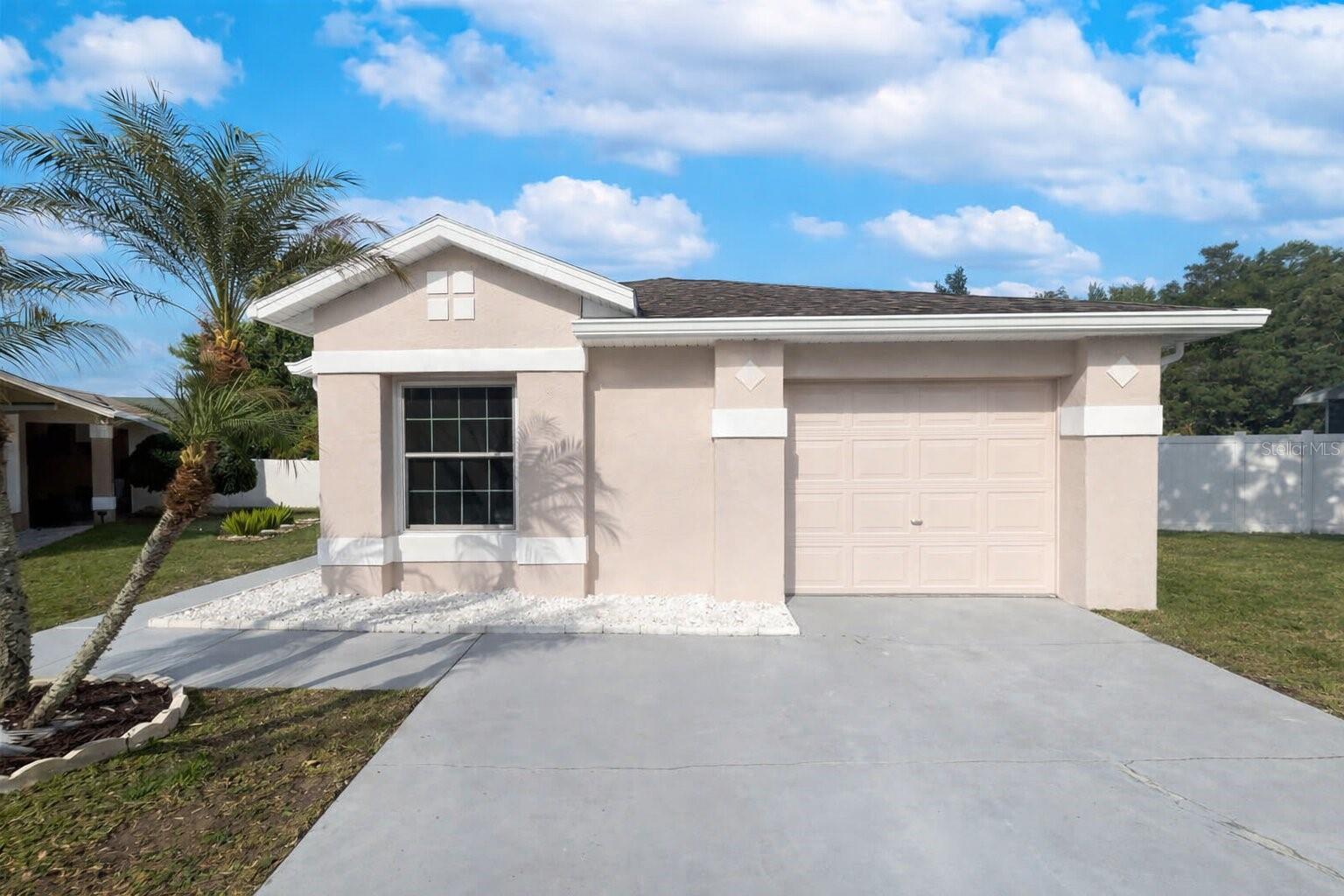255 CORALWOOD, KISSIMMEE FL 34743 — MLS #MFRO6404385 | 3 Bed 2 Bath Home