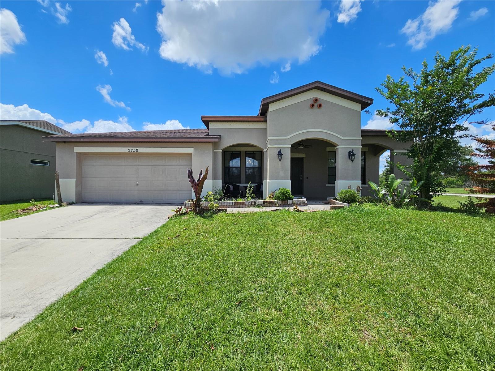 2750 CORBEL, KISSIMMEE FL 34746 — MLS #MFRO6405493 | 4 Bed 2 Bath Home