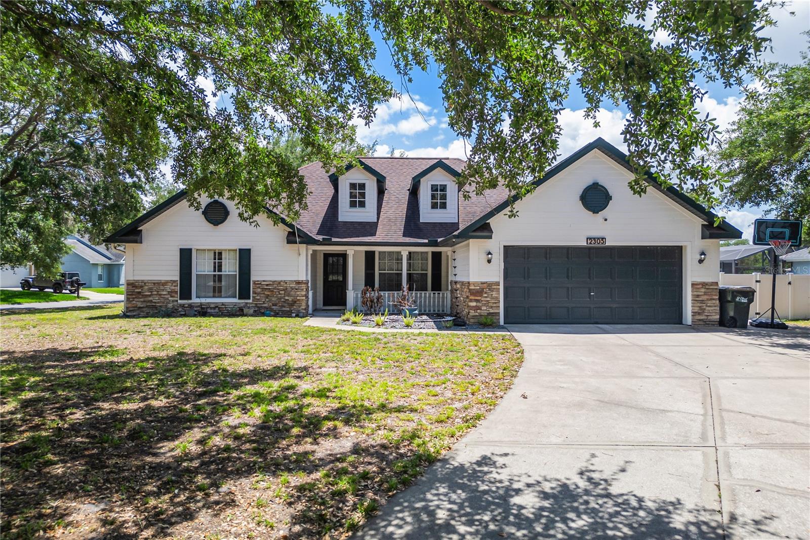 2305 JESSICA, KISSIMMEE FL 34744 — MLS #MFRO6407917 | 4 Bed 2 Bath Home