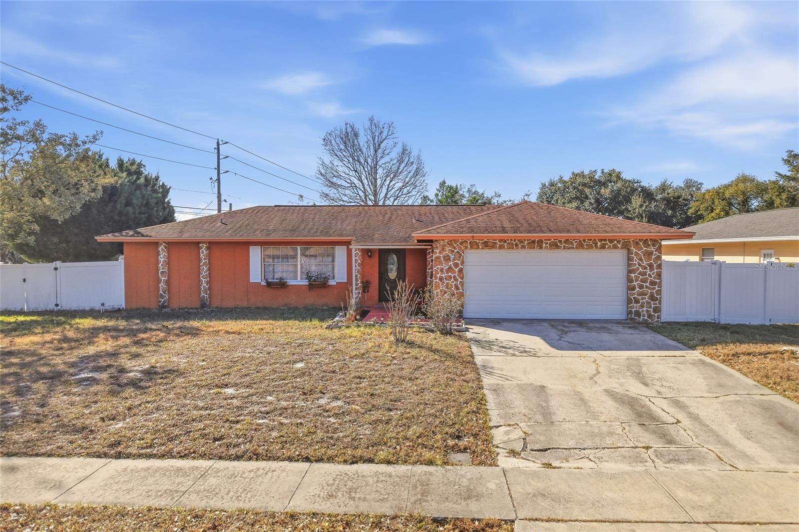 7002 CRESTLAKE, ORLANDO FL 32819 — MLS #MFRS5143293 | 4 Bed 2 Bath Home