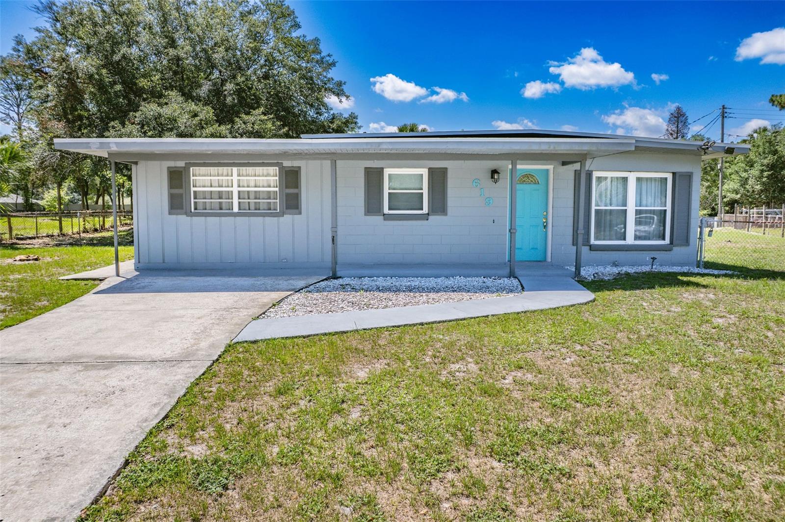 619 CAMELLIA, SANFORD FL 32773 — MLS #MFRO6400780 | 4 Bed 2 Bath Home