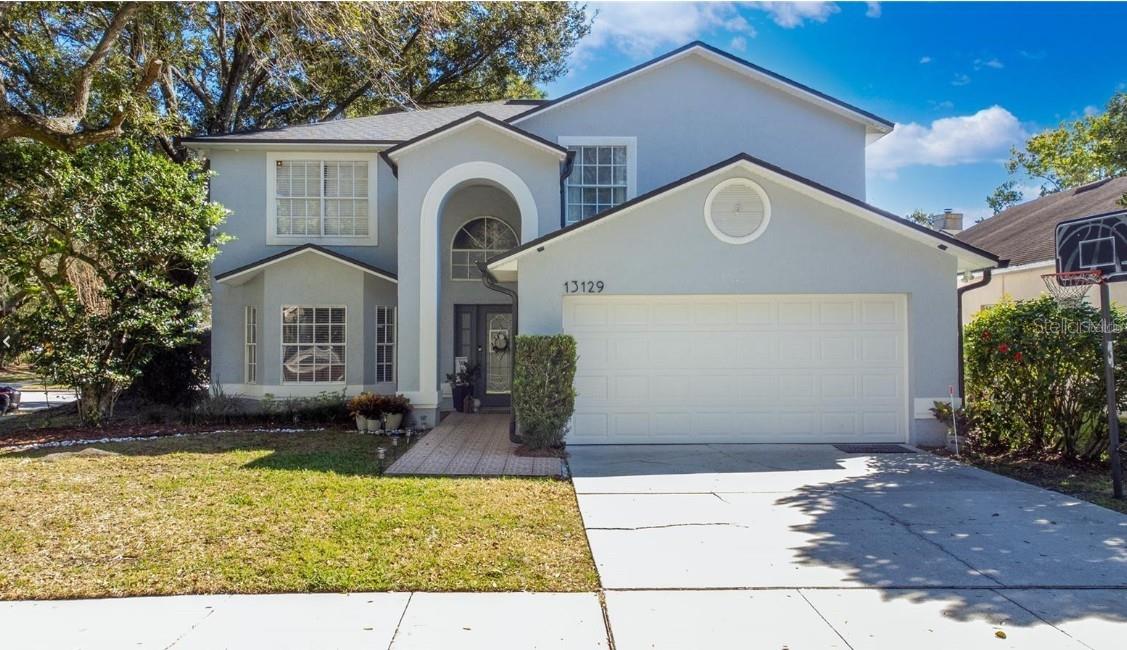 13129 COG HILL, ORLANDO FL 32828 — MLS #MFRS5149876 | 4 Bed 3 Bath Home