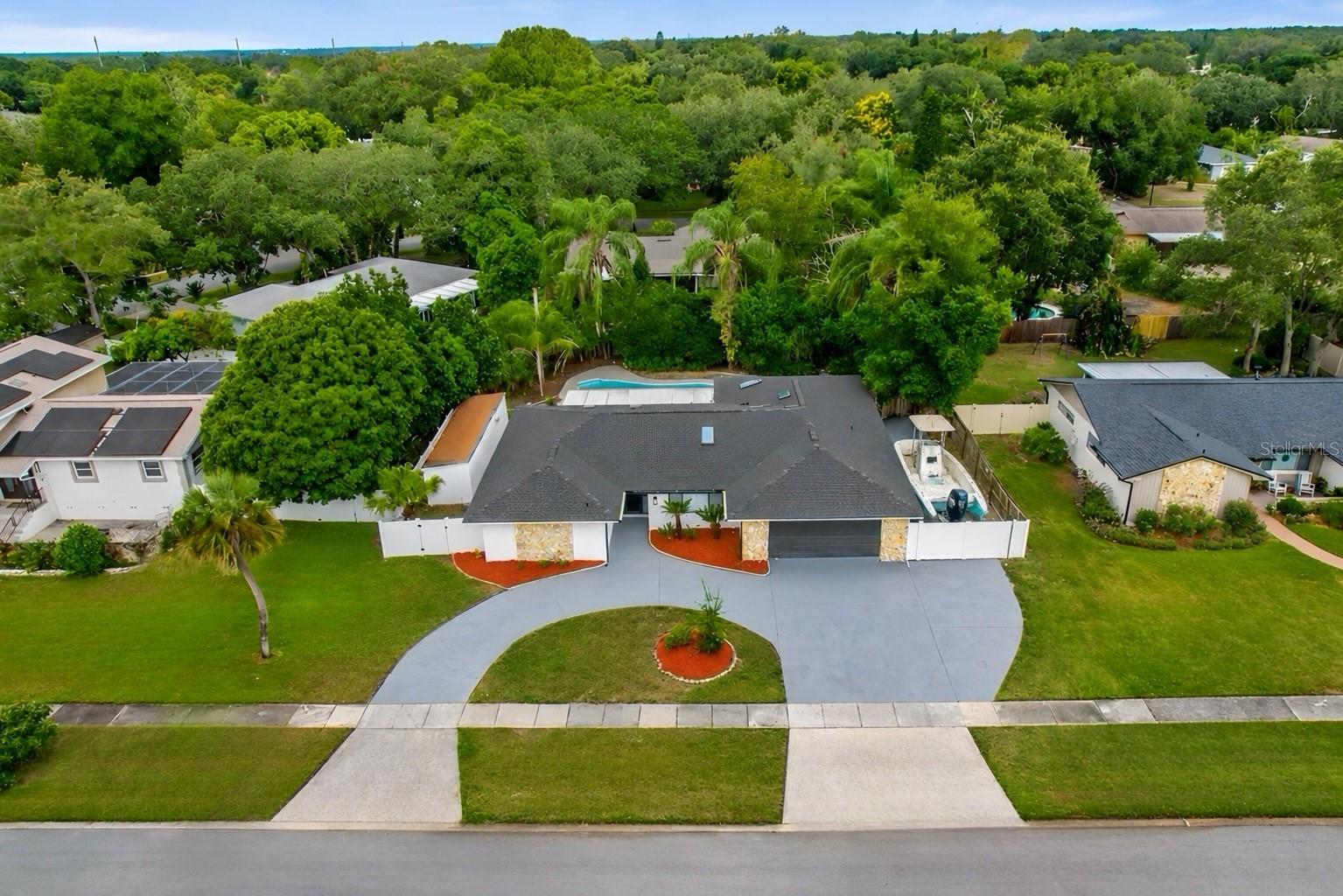 8241 CARAWAY, ORLANDO FL 32819 — MLS #MFRS5149735 | 4 Bed 2 Bath Home