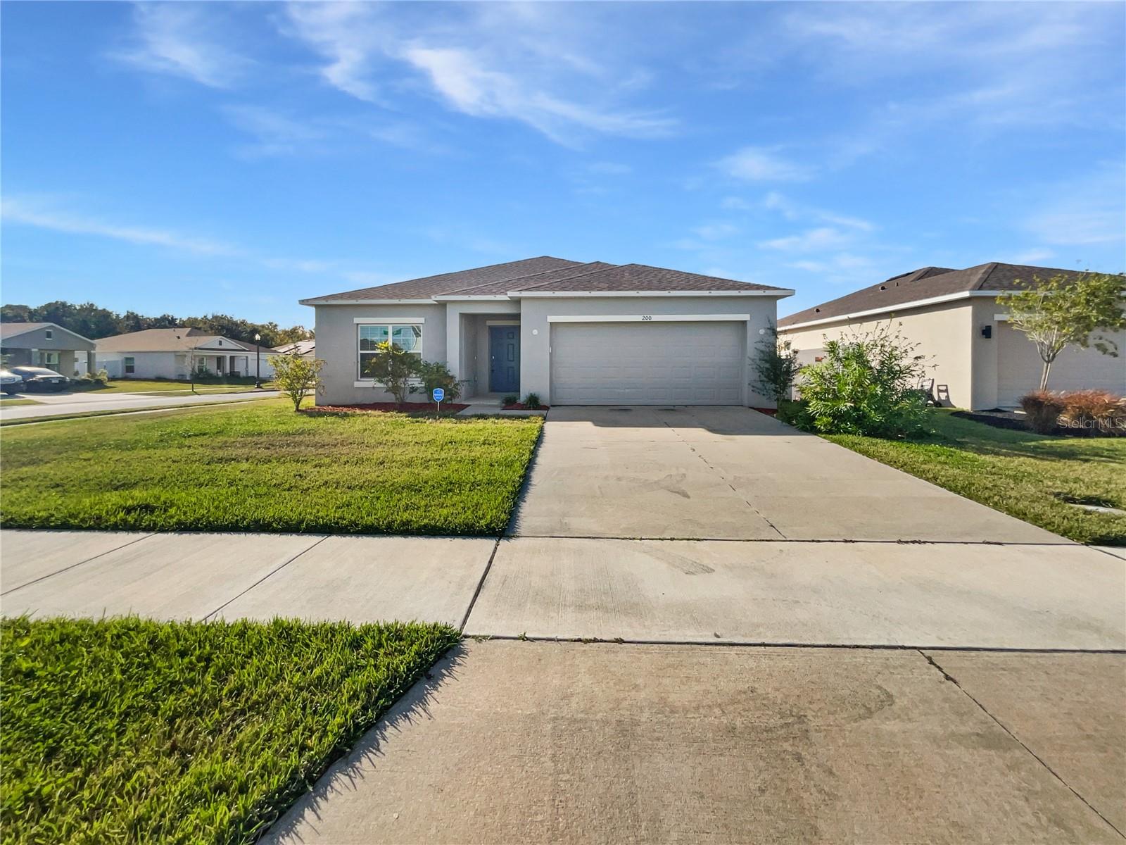 200 GARNET, KISSIMMEE FL 34758 — MLS #MFRO6366061 | 4 Bed 3 Bath Home