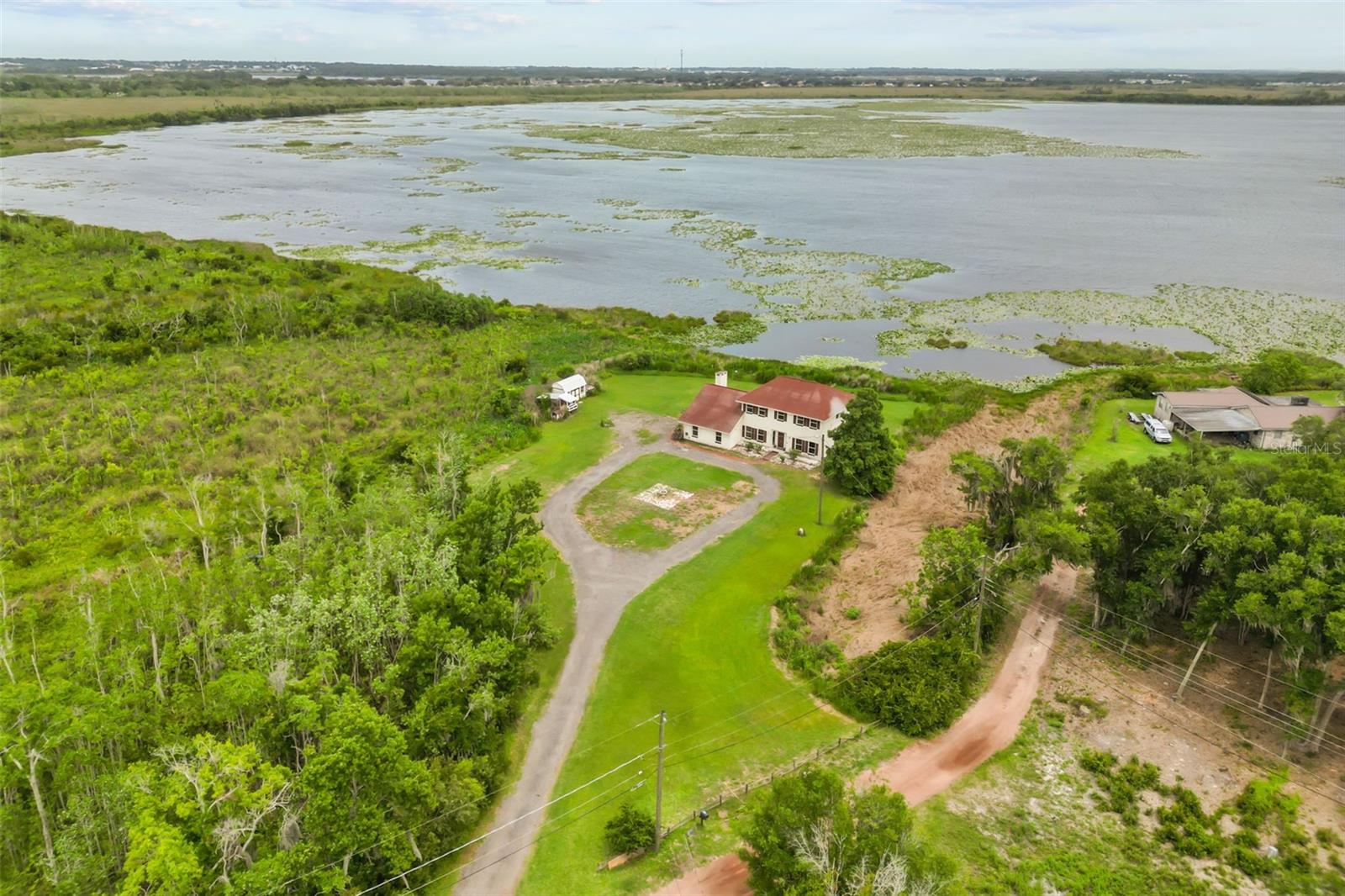 3101 LAKE LOWERY, HAINES CITY FL 33844 — MLS #MFRO6400161 | 4 Bed 3 Bath Home