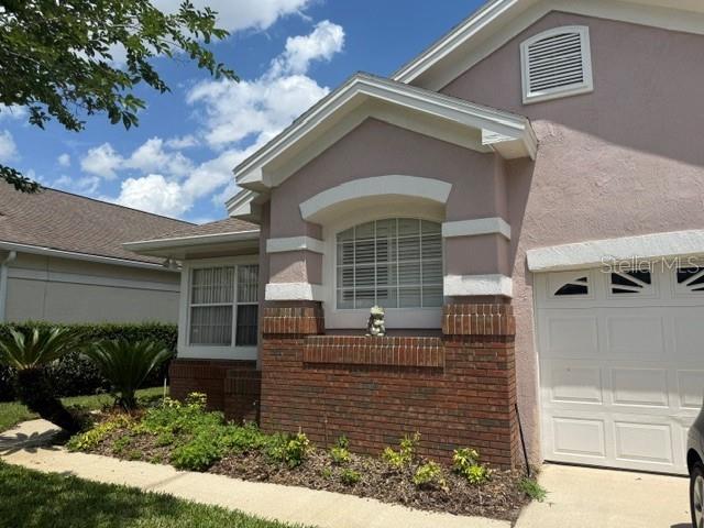 14453 WINDCHIME, ORLANDO FL 32837 — MLS #MFRO6408655 | 3 Bed 2 Bath Home