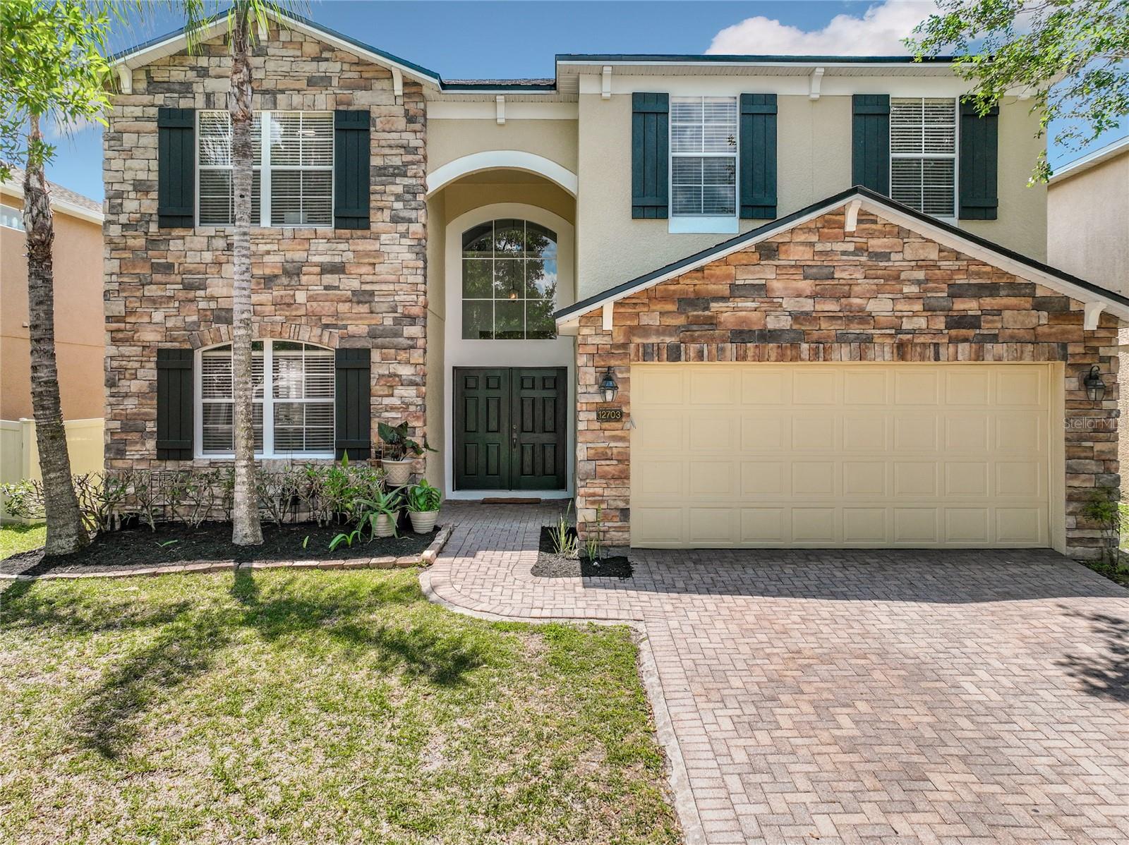 12703 MOSS PARK RIDGE, ORLANDO FL 32832 — MLS #MFRS5148941 | 5 Bed 4 Bath Home