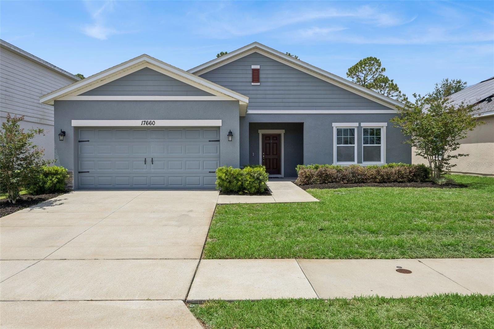 17660 PASSIONFLOWER, CLERMONT FL 34714 — MLS #MFRO6404594 | 4 Bed 3 Bath Home
