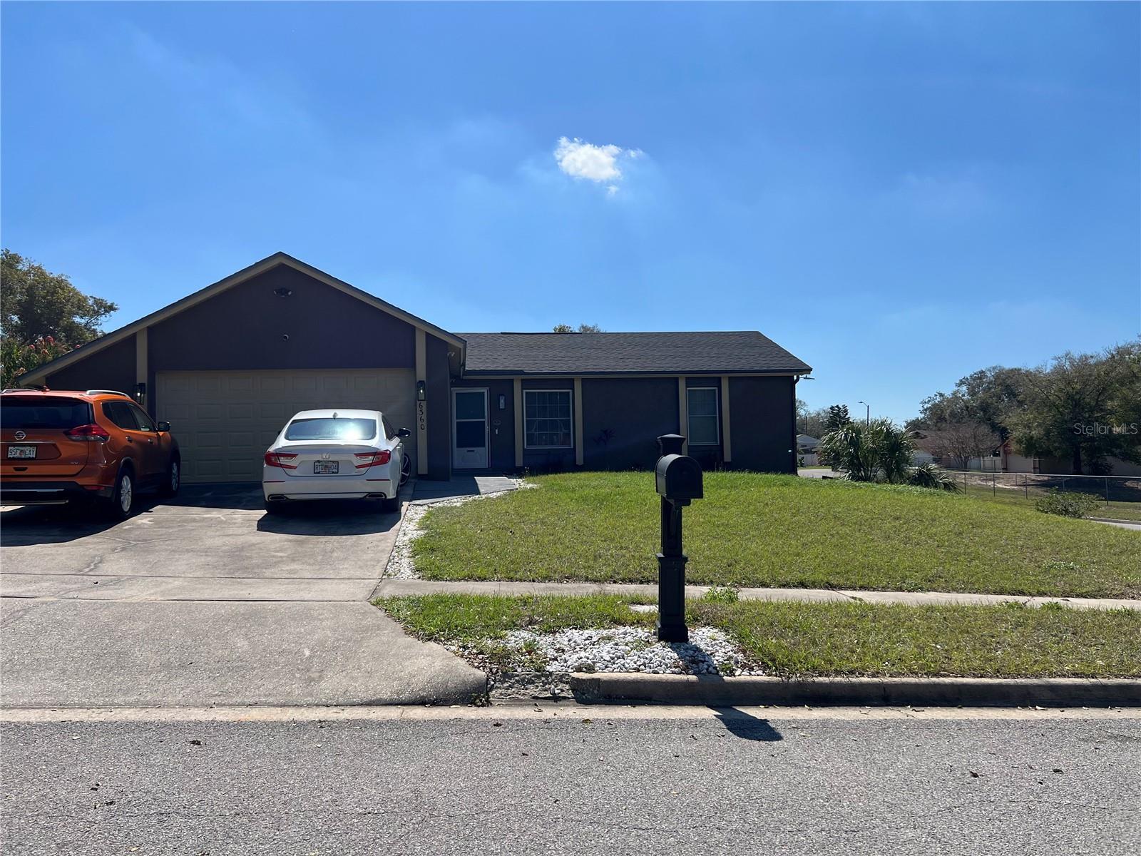6360 POWERS POINTE, ORLANDO FL 32818 — MLS #MFRO6405901 | 3 Bed 2 Bath Home