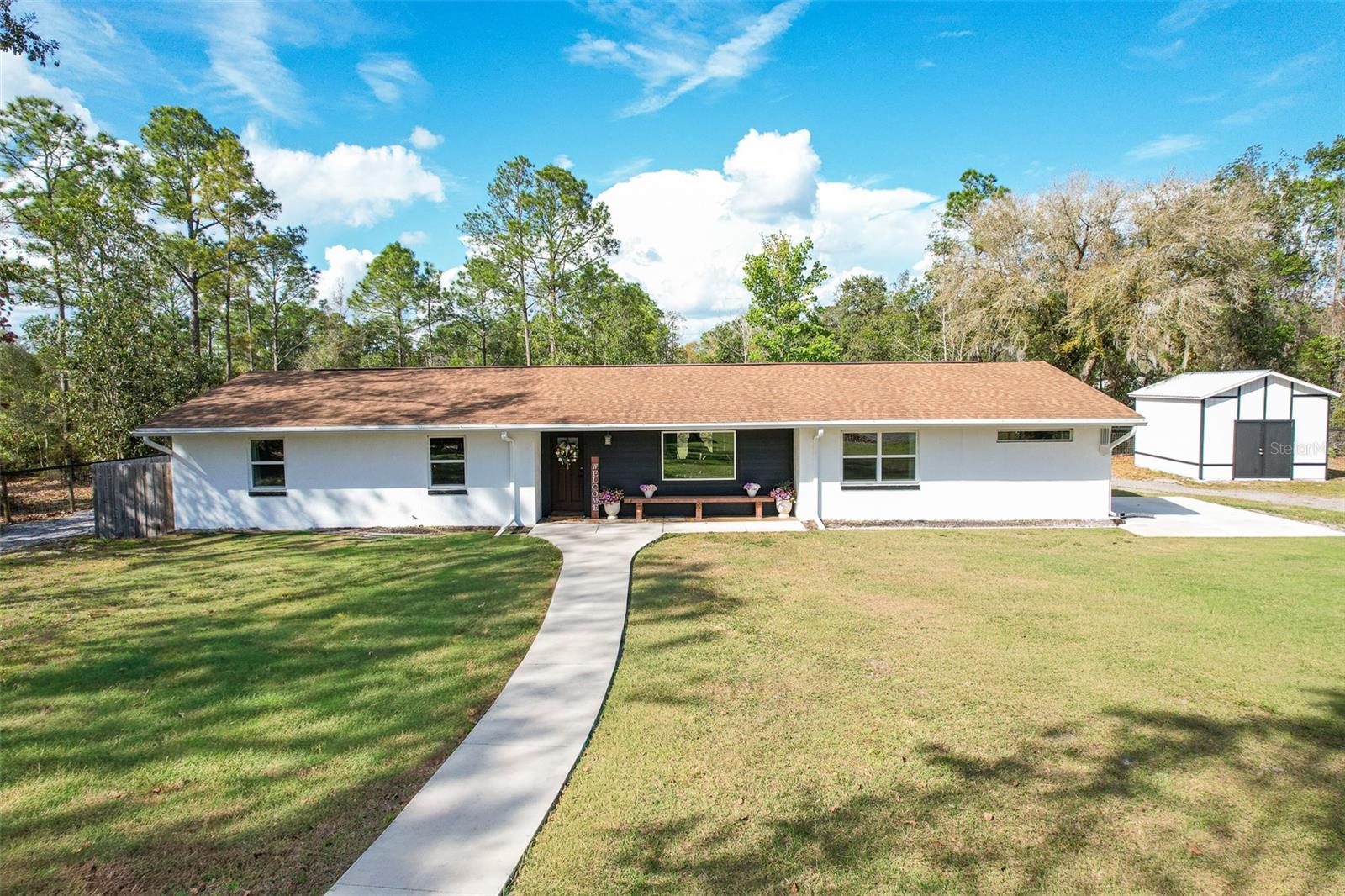 27035 STATE ROAD 44, EUSTIS FL 32736 — MLS #MFRO6405982 | 4 Bed 3 Bath Home